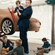 Illustration for article titled Elon Musk And His Tesla Model S Design Team